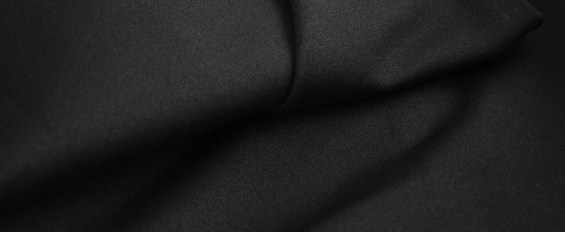 Φωτογραφία από ύφασμα ίντερλοκ λύκρα 270 μαύρο, ελαστικό αχνούδιαστο από πολυέστερ 90% & λύκρα 10%, Σαρρής υφάσματα, efasma.gr