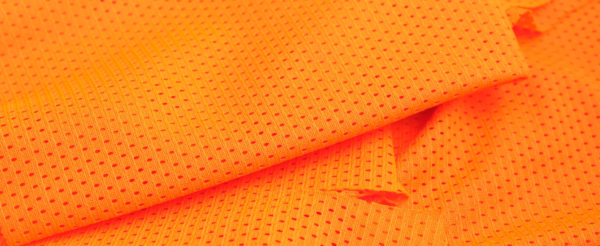 Φωτογραφία από ύφασμα τρυπητό σαλιάρα (mesh) πορτοκαλί από πολυέστερ 100%, κατάλληλο για αθλητικά ενδύματα, Σαρρής εμπόριο υφασμάτων, efasma.gr